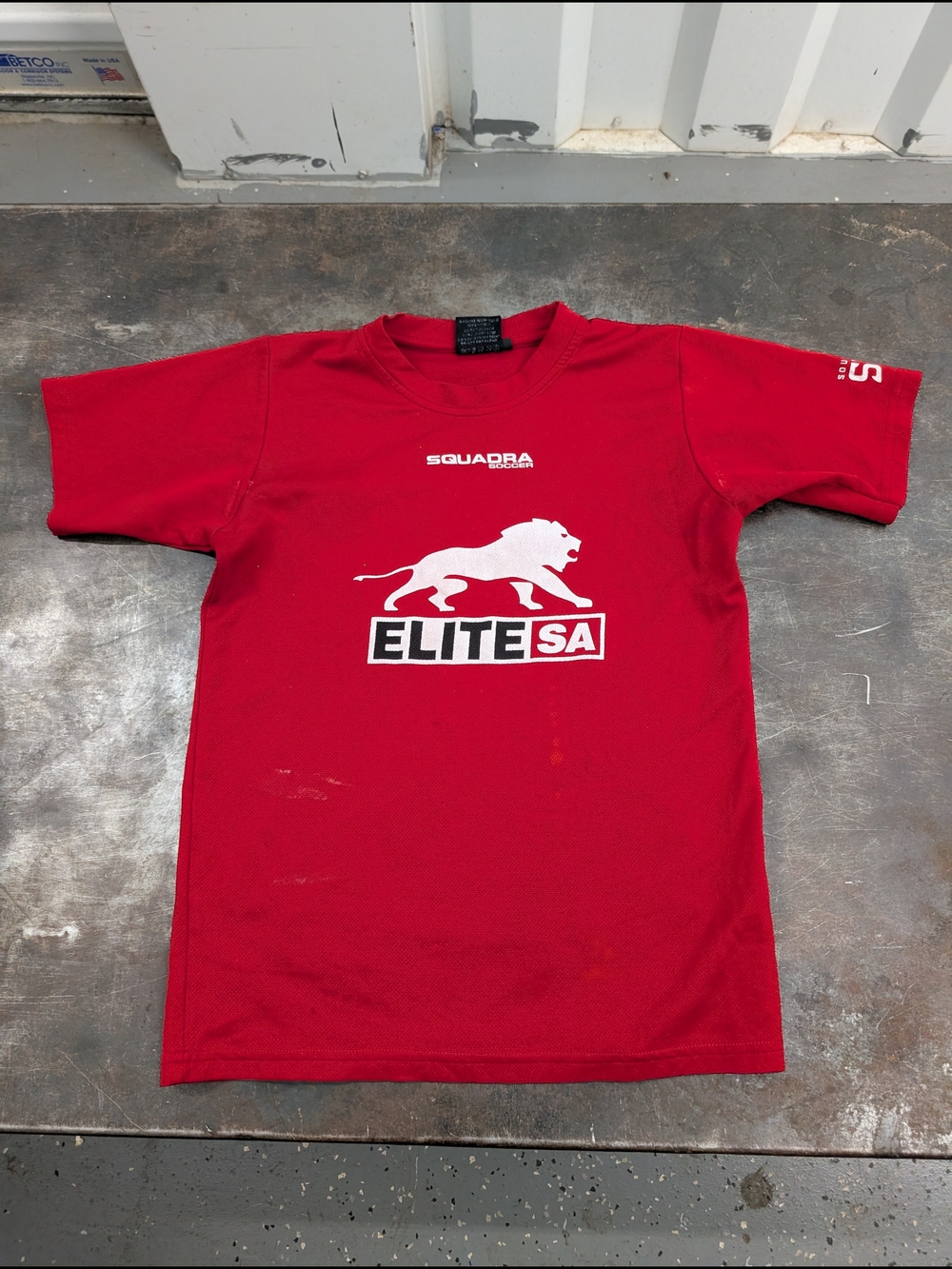 Elite SA Red Short Sleeve Tee with White Lion Graphic